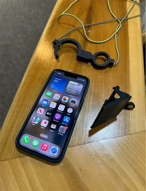 The foot harness next to the iphone